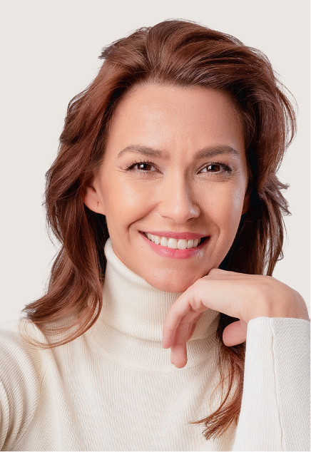 Patient smiling after her consultation